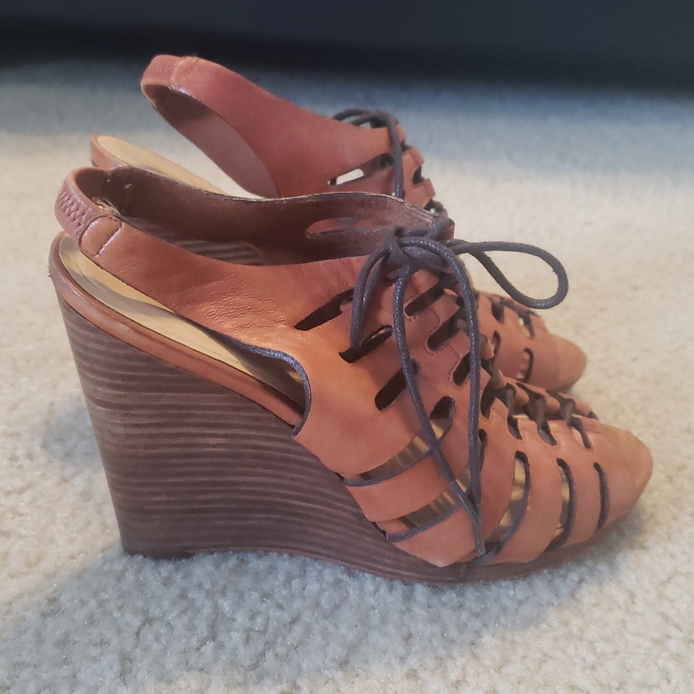 Worn wedge soft leather slingback.